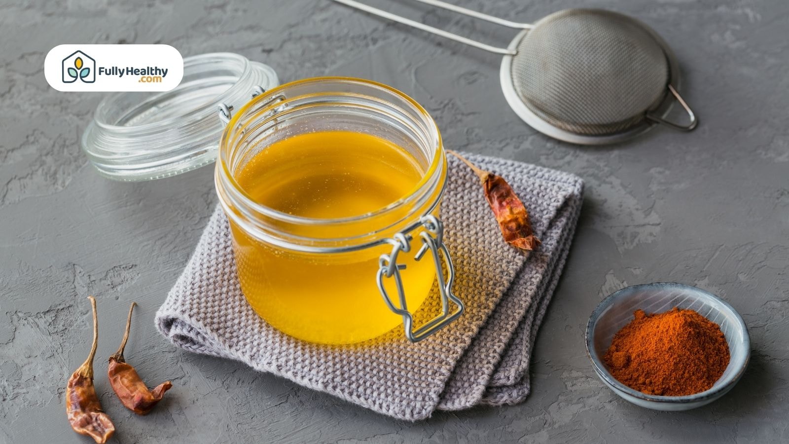 Homemade Ghee a jar, chili, and paprika po