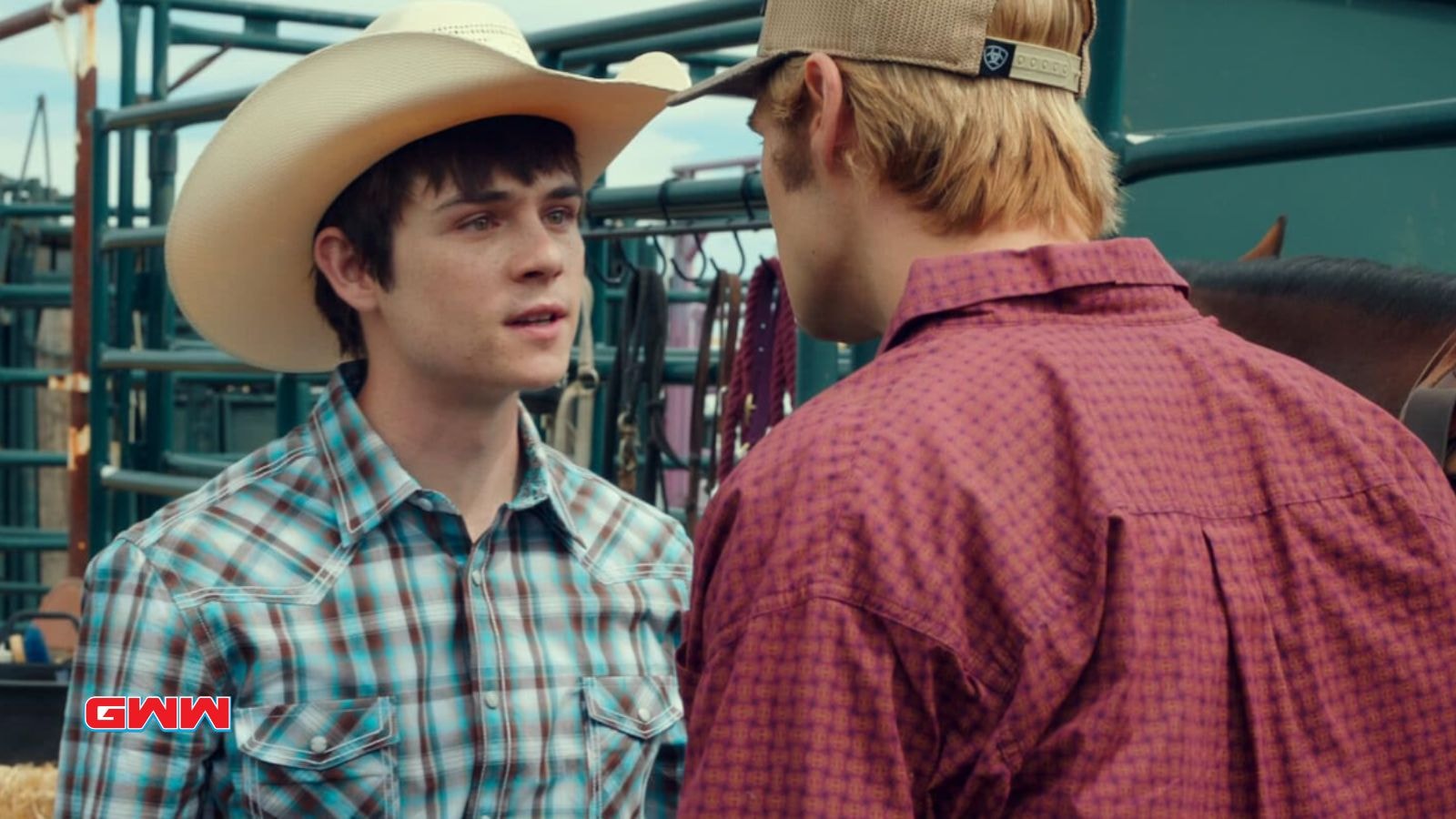 Cole Walter, in cowboy attire, confronts another character at the ranch.