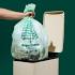 Hand holding compostable trash bag - from Repurpose