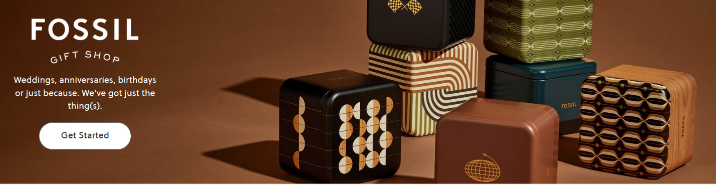 A group of black cubes with white and brown designs
Description automatically generated