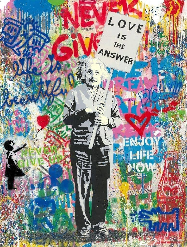 Surrounded by a graffiti backdrop full of symbols, Mr. Brainwash’s Einstein holds a sign that says ‘Love is the Answer’, a subtle bid to make art, not war.