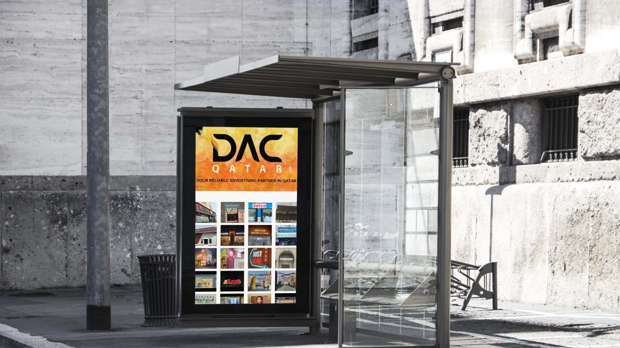 DAC Qatar outdoor display highlighting custom branding and signage solutions in public spaces Digital screen at a public bus stop in Qatar showcasing DAC Qatar’s custom branding and signage portfolio in a modern urban setting.