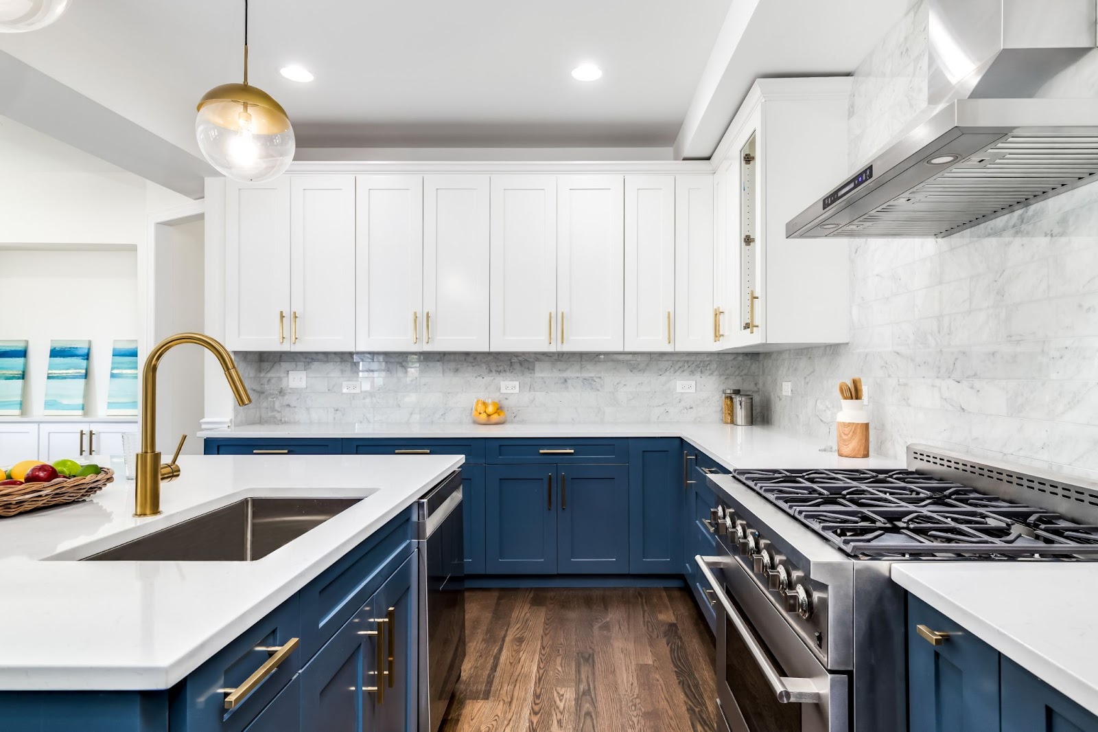 Kitchen with white upper cabinets and dark blue lower cabinets