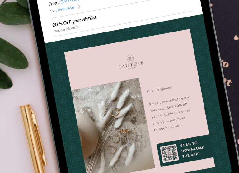 An example of an email from a jewelry brand that encourages readers to download the brand's mobile app by scanning a QR Code