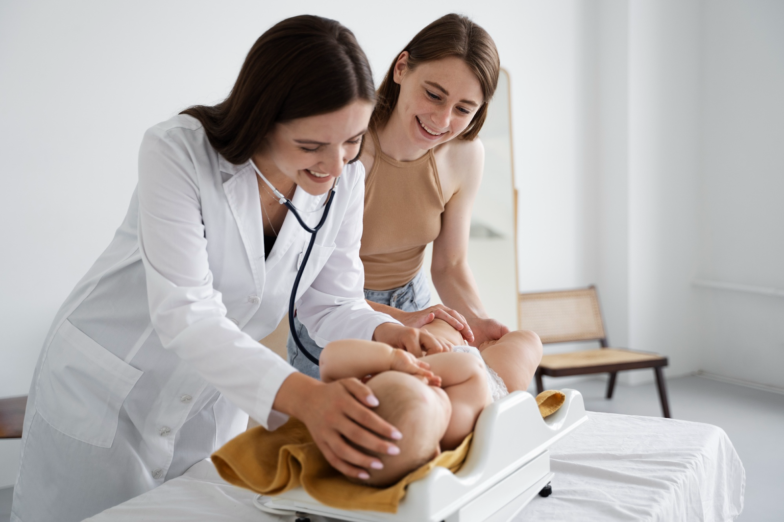 Doctor checking up on a baby