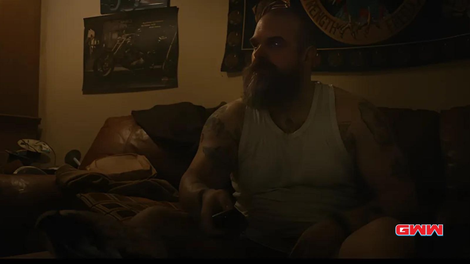 David Harbour as Red Guardian sitting on a couch in Thunderbolts