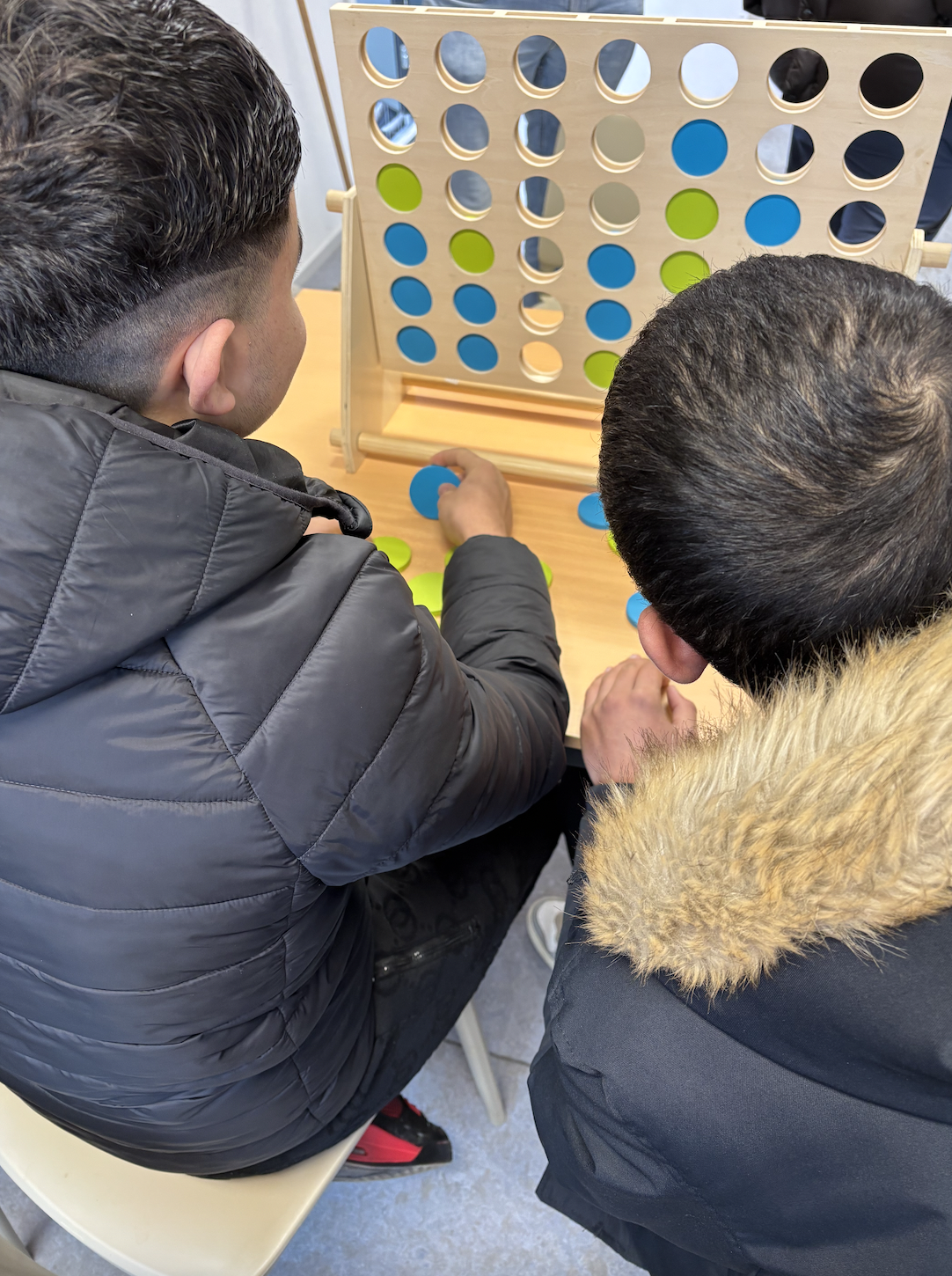 Boys in Biddinghuizen play a game.