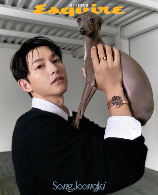 This contain an image of  Song Joong Ki and his dog 