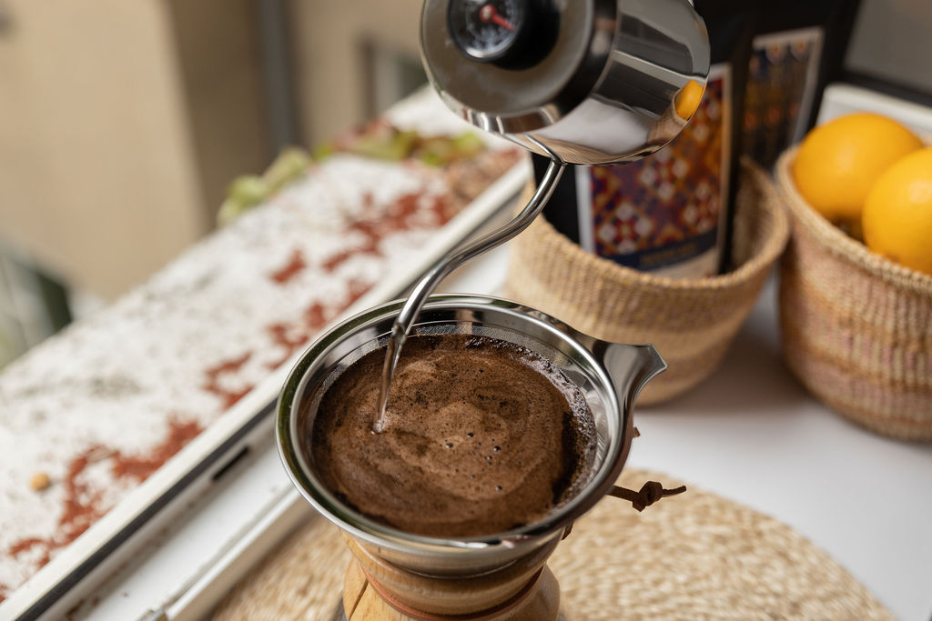 A coffee bean grinder designed for grinding Arabica coffee beans, showcasing its sleek and functional design.