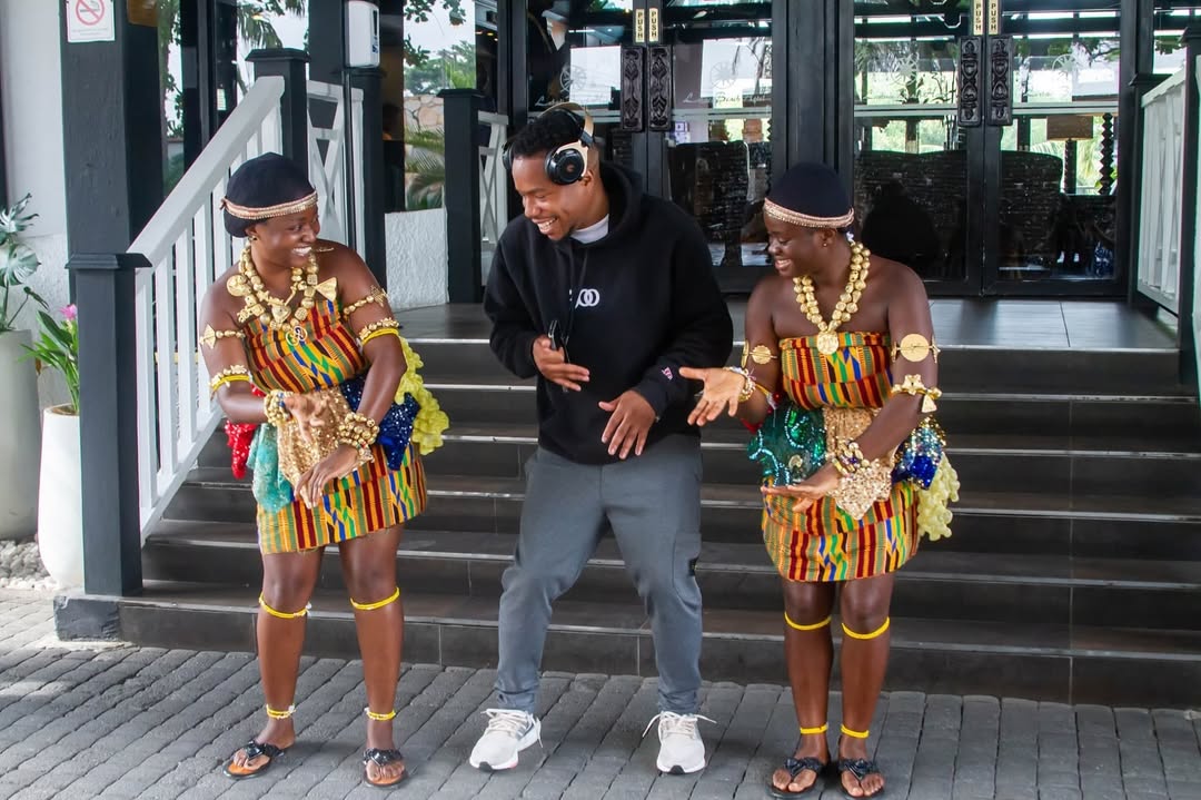 Adowa dance performers welcoming Austin Palmer in Ghana. photocredit: Ann Ntow on Instagram