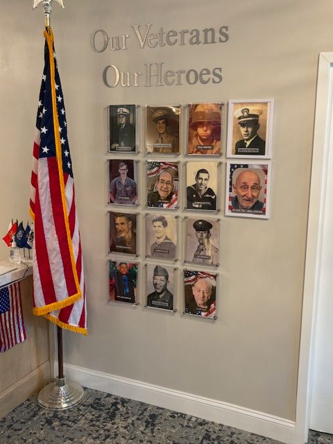 Wall of photos of veterans