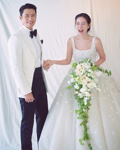 This  contain an image of Hyun Bin and Son Ye Jin in a wedding dress