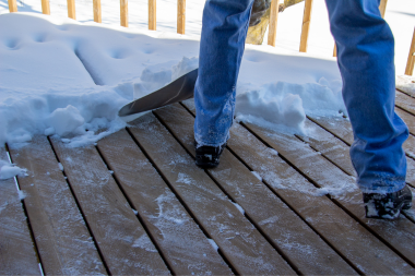 how to extend the lifespan of your michigan deck wood or composite shoveling snow off decking boards custom built okemos