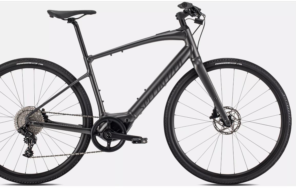 Specialized Turbo Vado SL 4.0 city e-bike with a lightweight alloy frame, mid-drive motor, and clean matte finish. Engineered for fast, agile urban commuting in 2025.