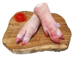 Raw meat on a cutting board

Description automatically generated