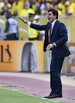 Ecuador's coach Gustavo Quinteros gestures during the Russia 2018 FIFA World Cup South American Qualifiers' football match against Paraguay, in Quito...