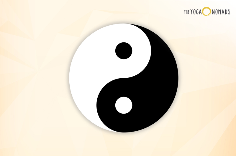 The image displays the Yin and Yang symbol, a circular design divided into two swirling sections—one black and one white—each containing a dot of the opposite color. This symbol represents the concept of dualism in ancient Chinese philosophy, where seemingly opposite forces are interconnected and interdependent. 