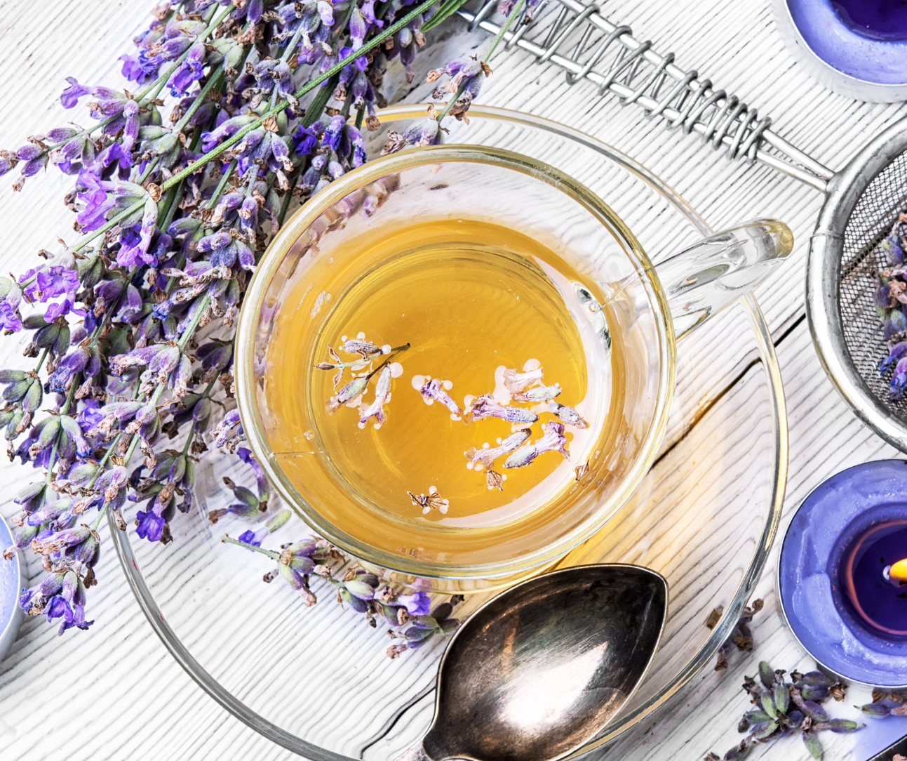 a cup of herbal tea and lavender flowers