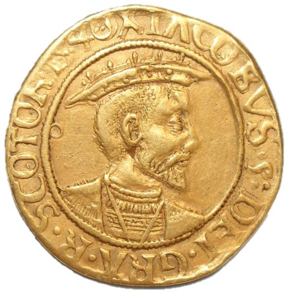 A gold coin with a person's face

Description automatically generated