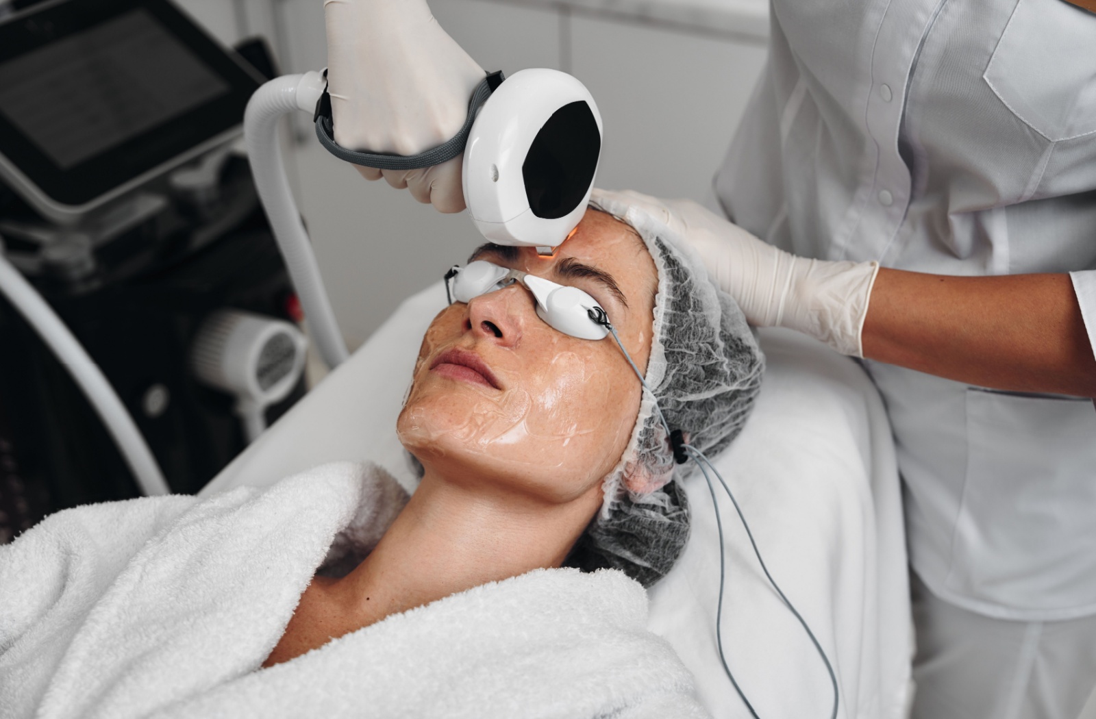 A person wears protective goggles during this IPL treatment for dry eye therapy.