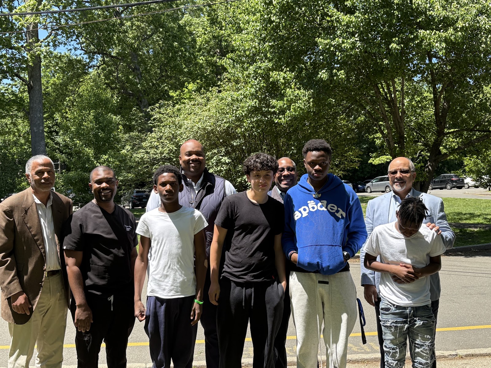 100 BLK Men representatives with students