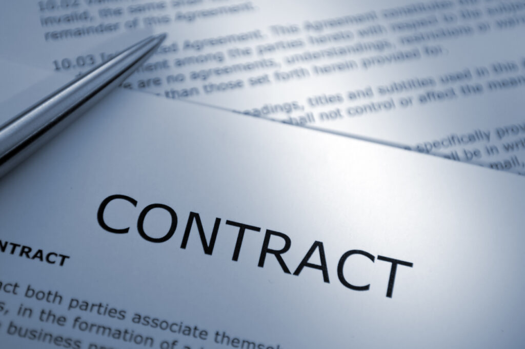 Close-up of a contract document with pen symbolizing private labeling and manufacturing agreements