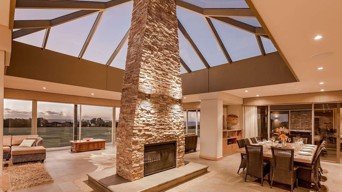 Living room with large stone fireplace