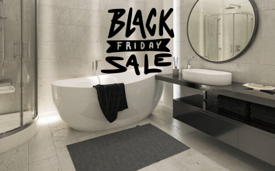 A bathroom with a black and white bathtub