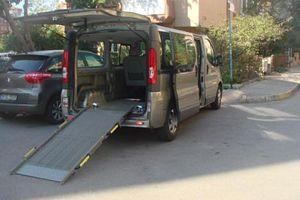 A van with a ramp

Description automatically generated