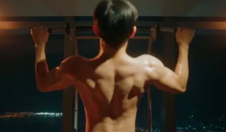 This contains an image of Jin-young muscular build