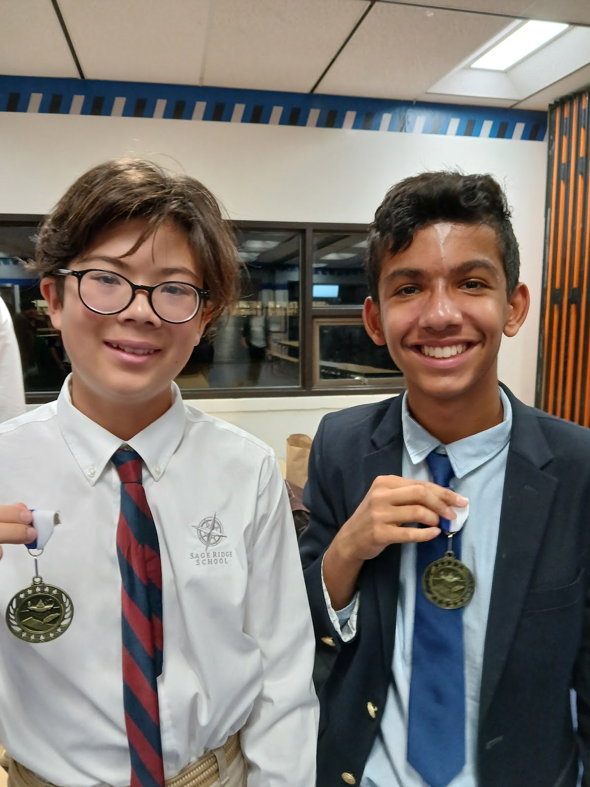Sage Ridge Debaters Justin Sloyan and Milin Sekhon at the 2024 McQueen High School Tournament