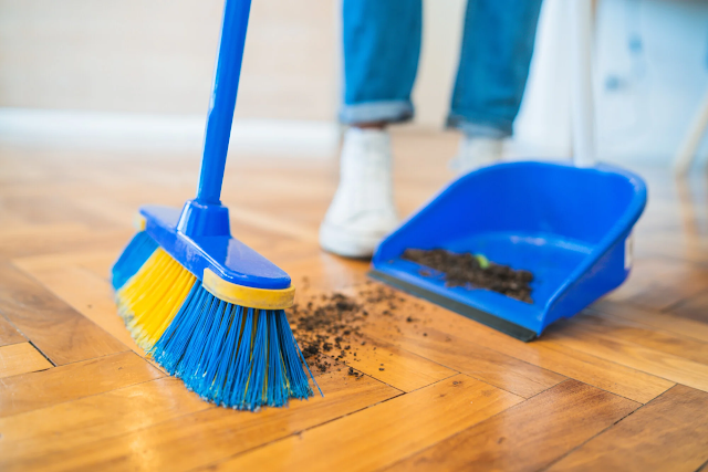 a brush sweeping the floor