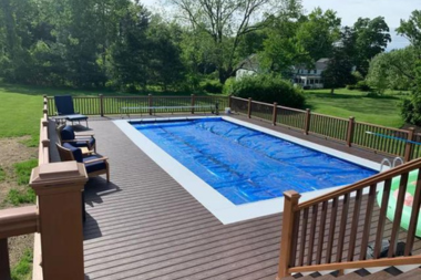 making a decking splash comparing composite pool deck designs traditional horizontal layout with chairs custom built michigan