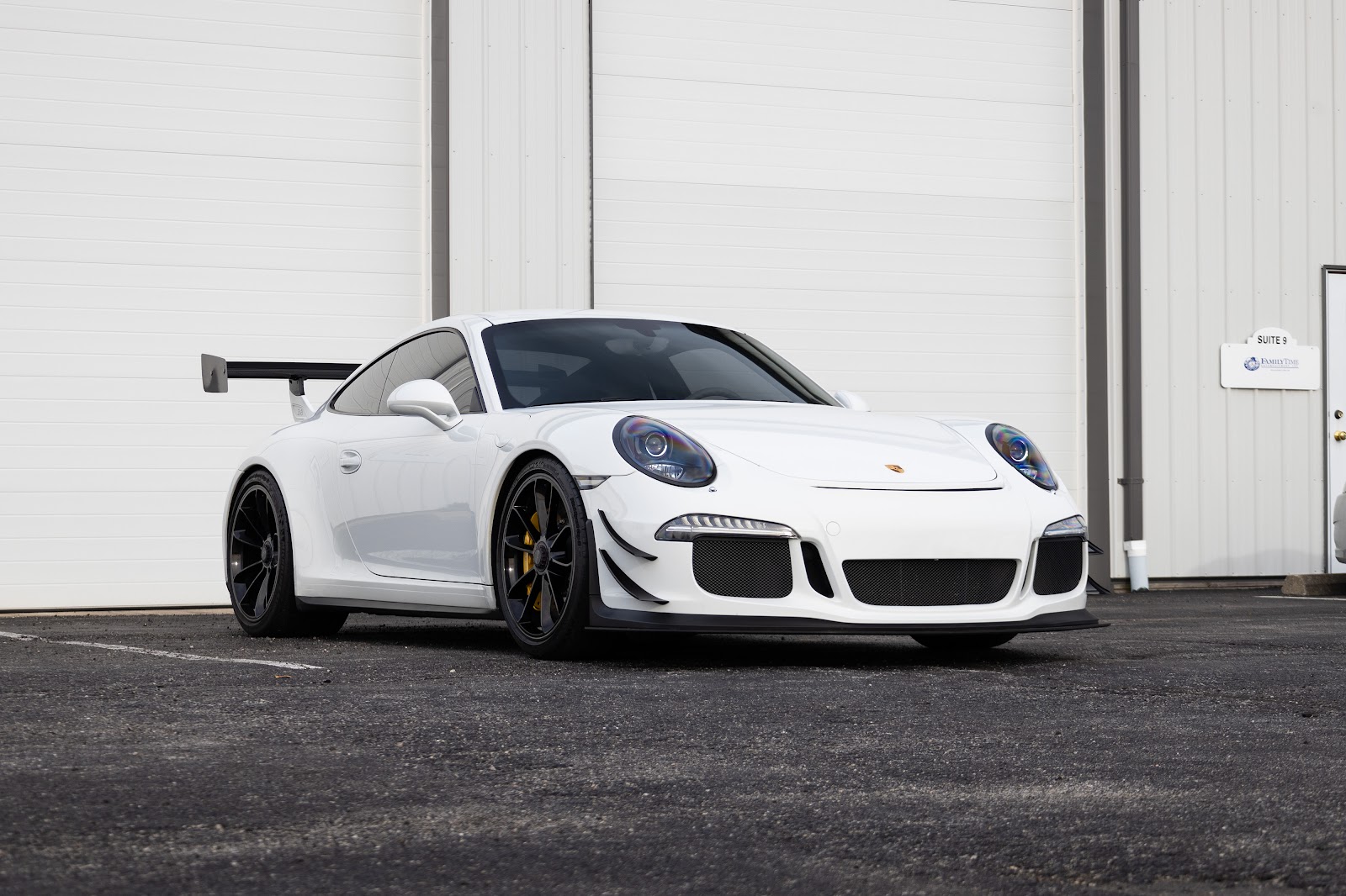 Porsche 991 GT3 with dive planes, splitter, and rear wing