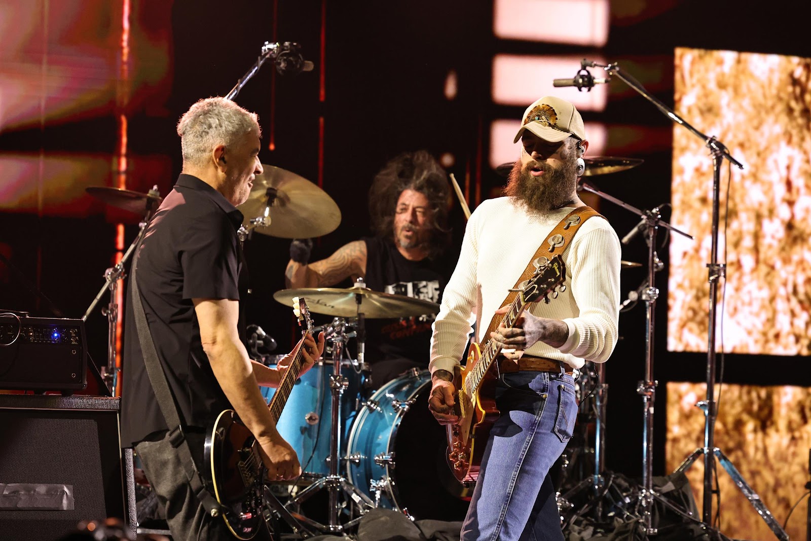 Pat Smear, Dave Grohl and Post Malone during "SNL50: The Homecoming Concert" on February 14, 2025 | Source: Getty Images