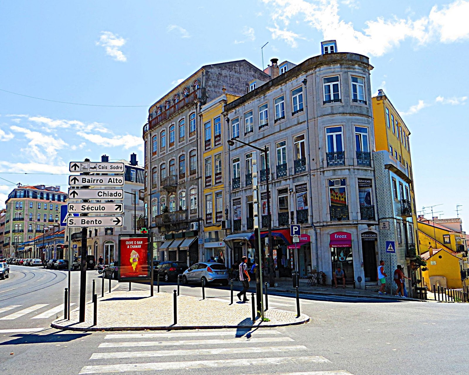 Street view with tall buildings.