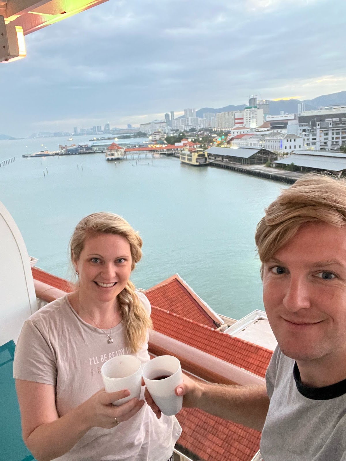 family holiday date night. save the date night. date night, singapore. balcony. cruise. bottle of red wine. 