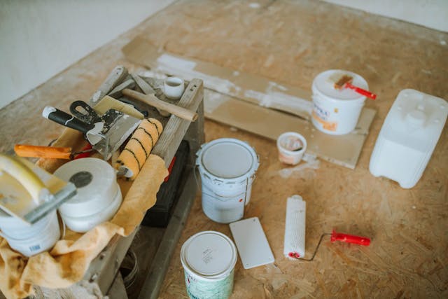 painting accessories sitting on the floor