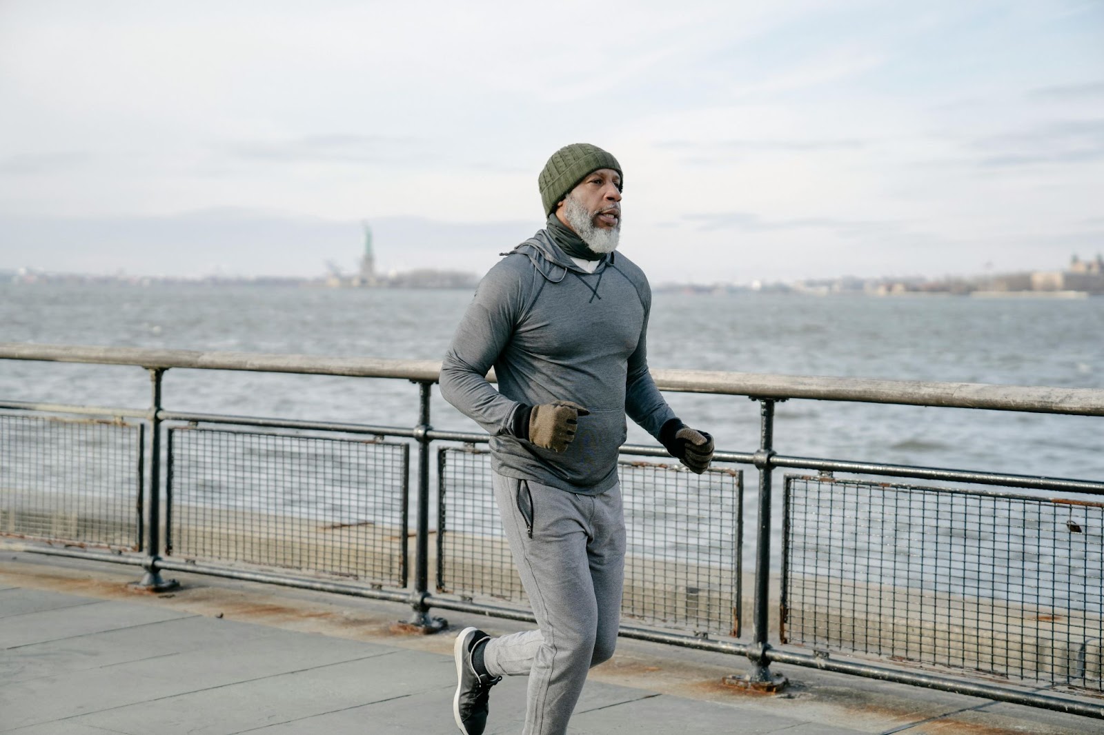 A man running by the ocean