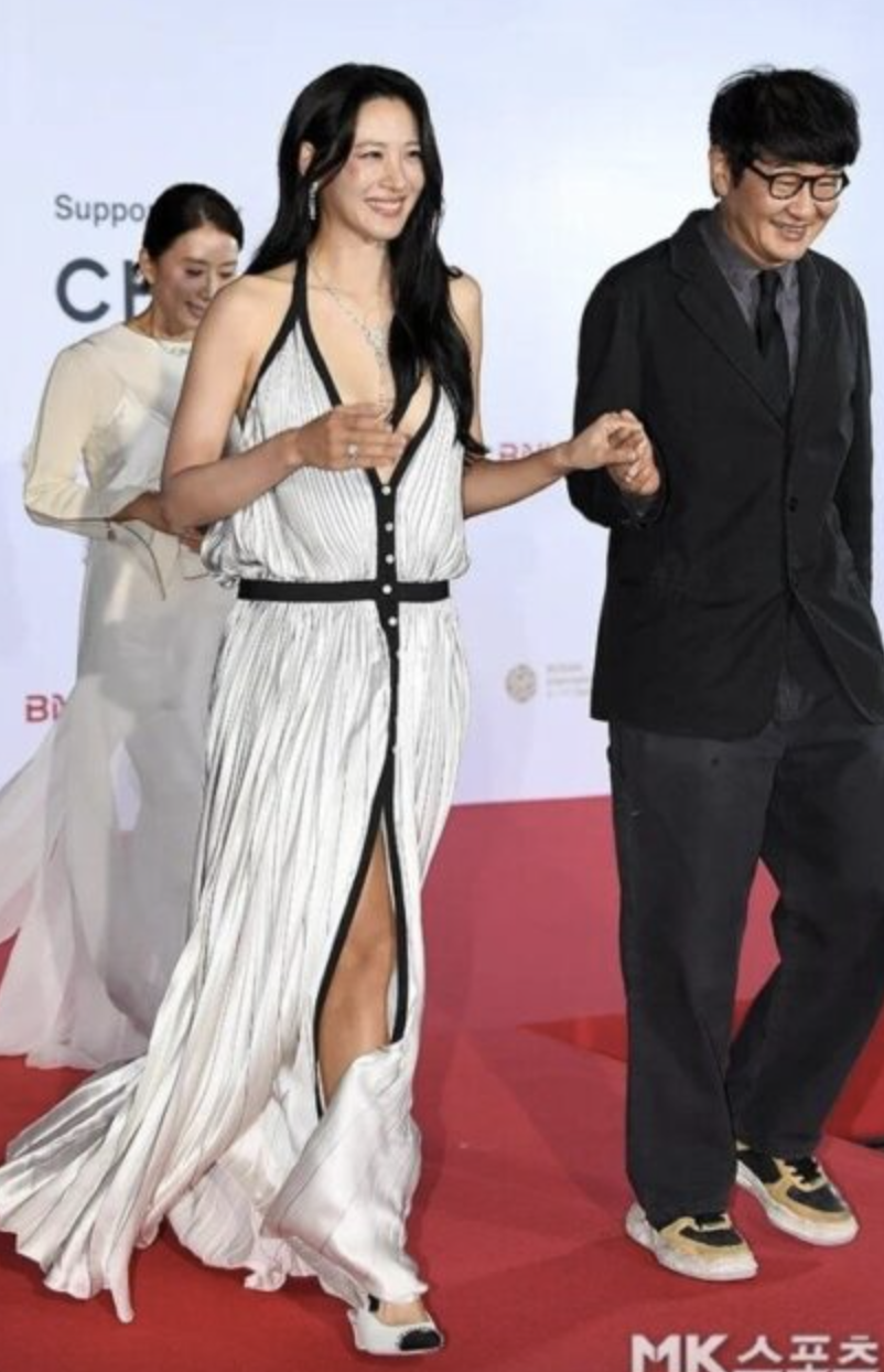 This contain an image of  Claudia Kim Kim Soo Hyun off-white dress