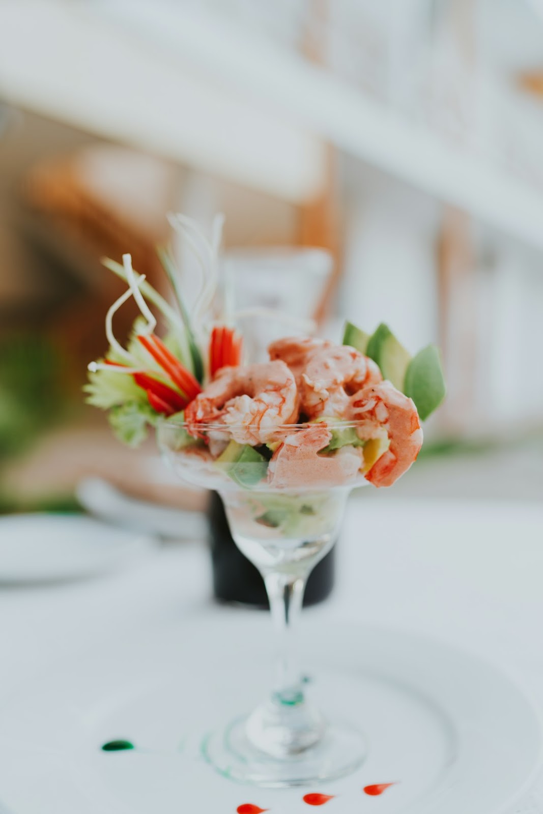 Wedding cocktail menu display with beautiful floral accents