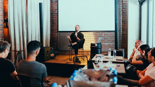 Free Photo Of Man Holding Mic Stock Photo