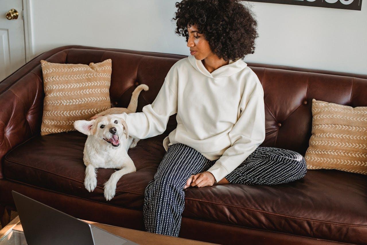 A pet parent showing love to her dog