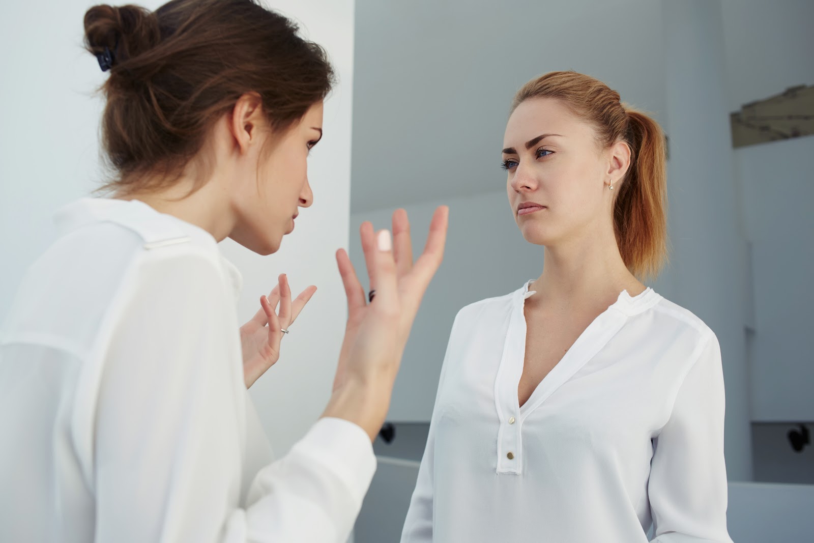 Two women arguing | Source: Shutterstock