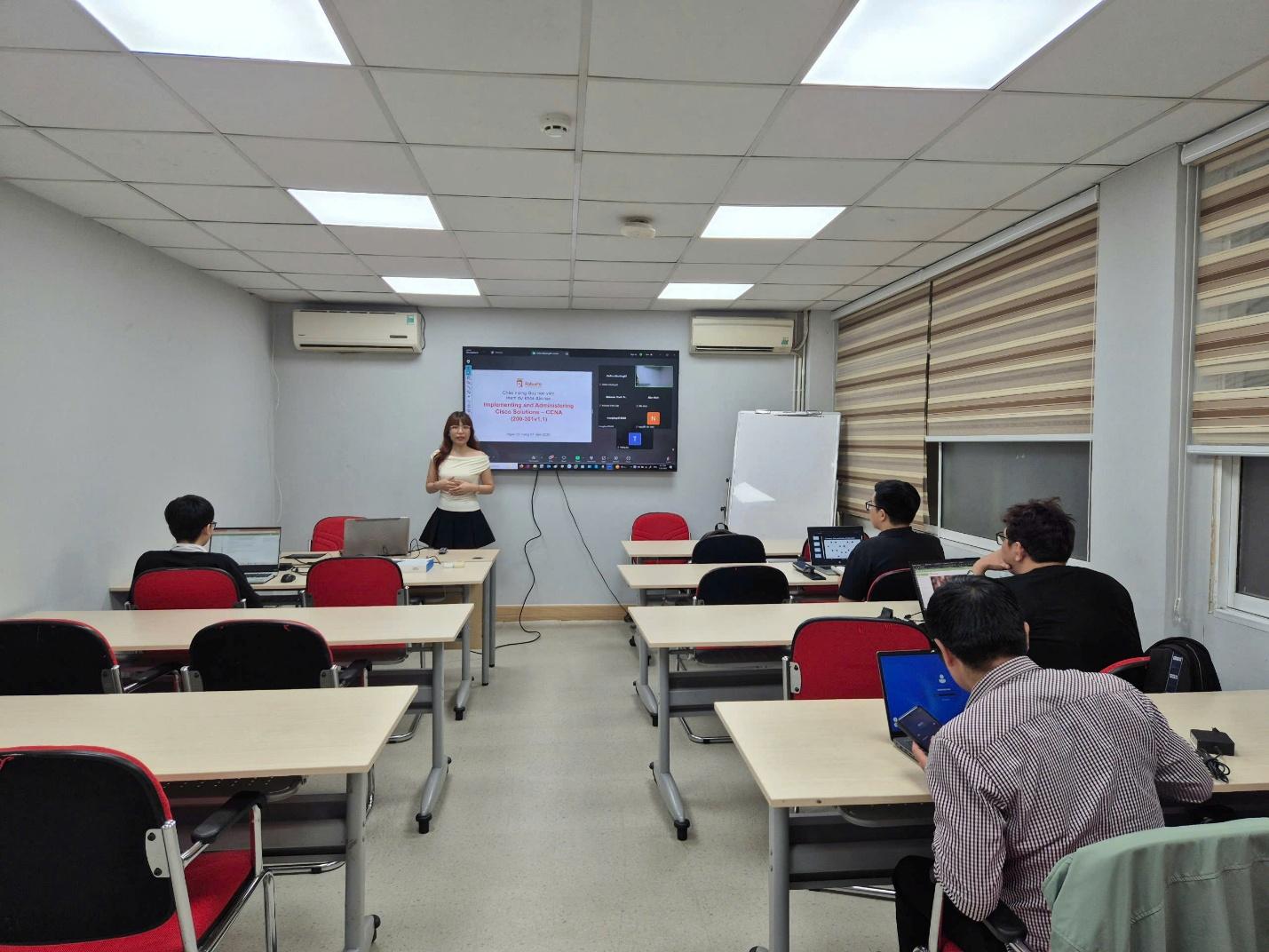 A person standing in front of a classroom

AI-generated content may be incorrect.