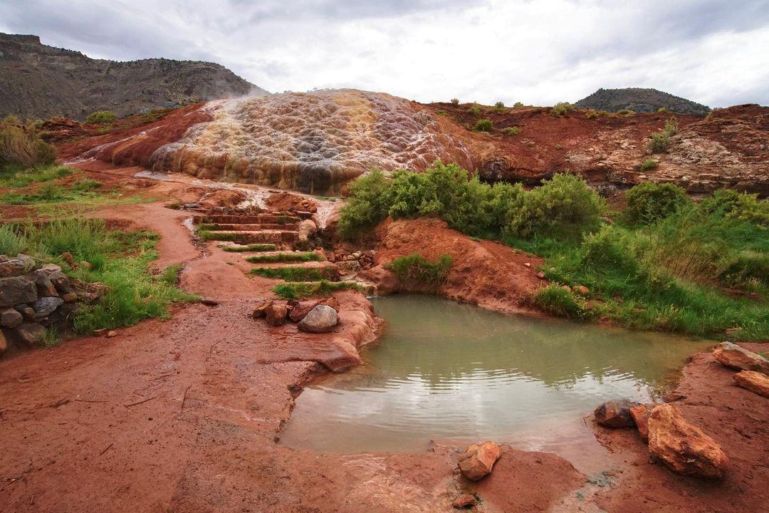 Showcasing a closeup detail of RED HILL HOT SPRINGS.