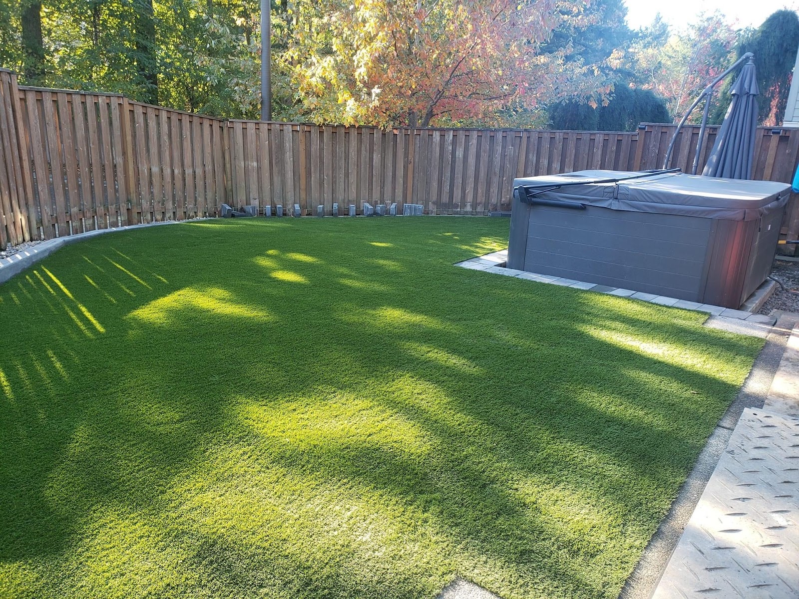 Artificial turf adds green to this backyard