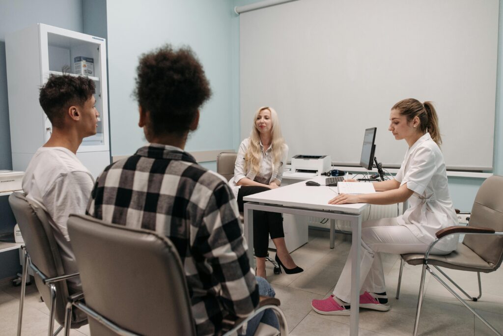 Doctor talking to patients 