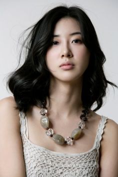  A picture of Jang Mi In Ae on milk dress