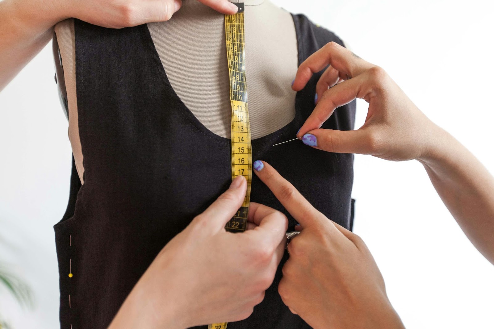 an image of a dress fitting to provide correct sizing